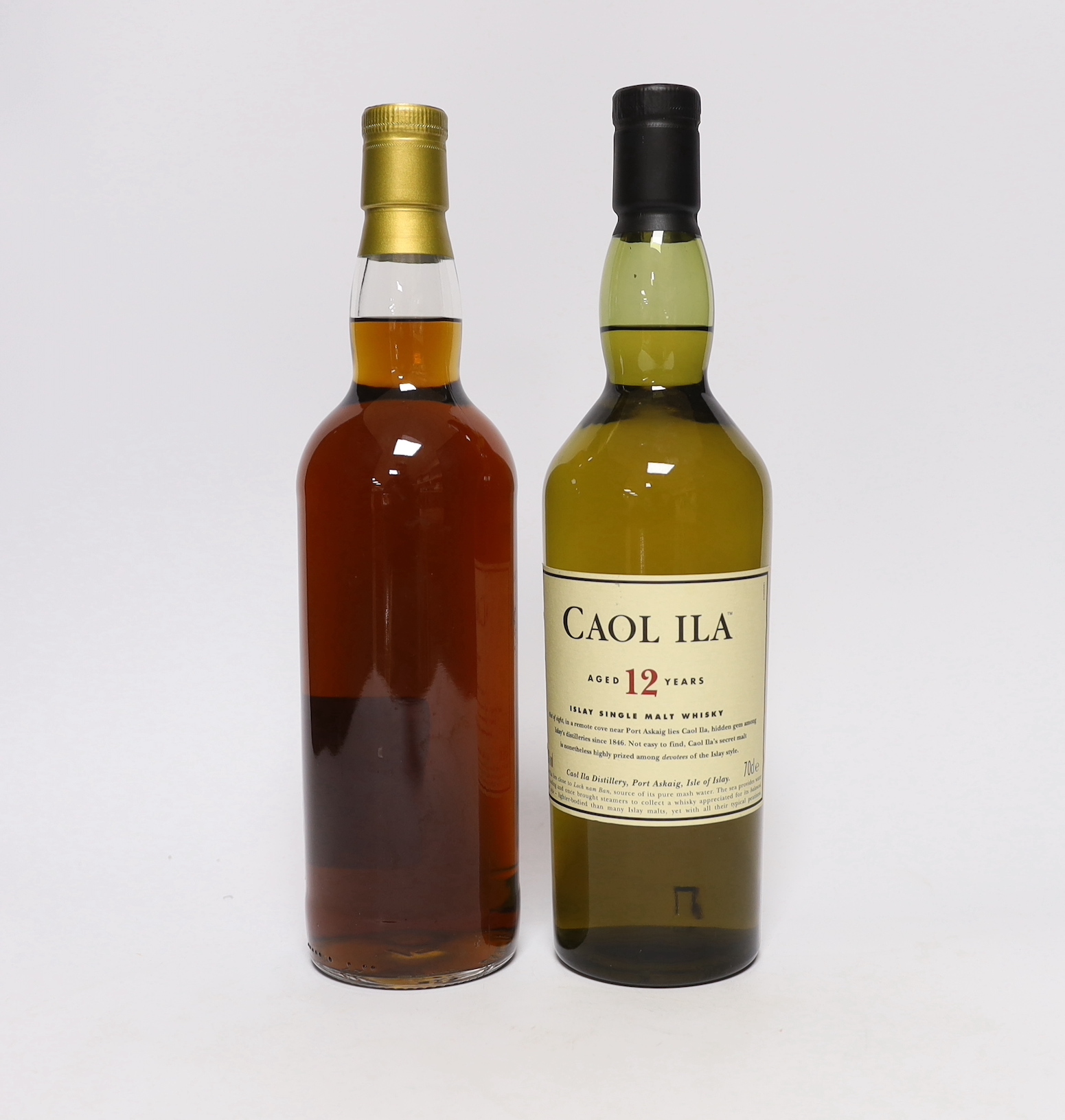 A bottle of Caol Ila 12 year old malt whisky and a bottle of Bruichladdich Islay single malt, private single cask bottling, bottled 2015